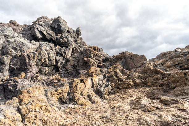 istock Lava Fields, Pumice Volcano Stones Texture, Volcanic Pumice Pattern, Pieces of Lava, Basalt Extrusive Igneous Rock 2203995329
