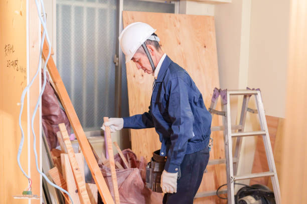 Male carpenter working on a condominium renovation site