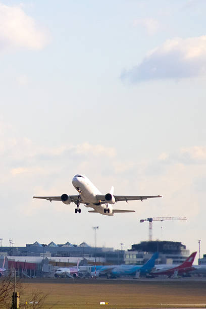 istock Airplane taking off from an airport 2204005877