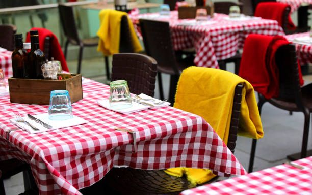 Dinner table with plates and glasses.