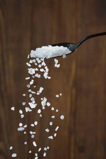 Organic salt on wooden background