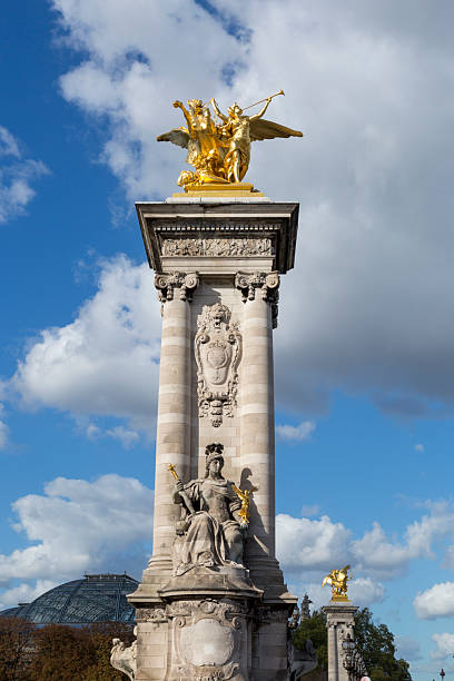 istock Europe, Paris. Statues at Pont Alexandre III, along River Seine. 2204014057