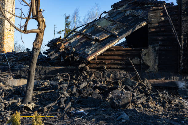 istock A significant fire has destroyed a wooden structure, leaving behind a heavily damaged site with ash and debris scattered everywhere 2204016123
