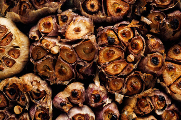 Spices Peppers of various colors and sizes with garlic