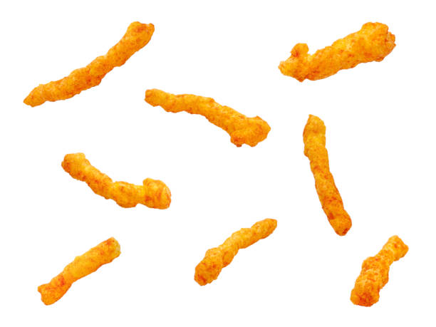 istock crispy corn stick floating on white background. Spicy snack isolated. 2204020740