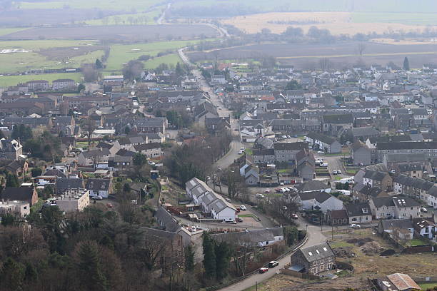 istock Aerial view over a village surrounded by countryside 2204024701