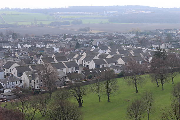 Rows of houses surrounded by countryside