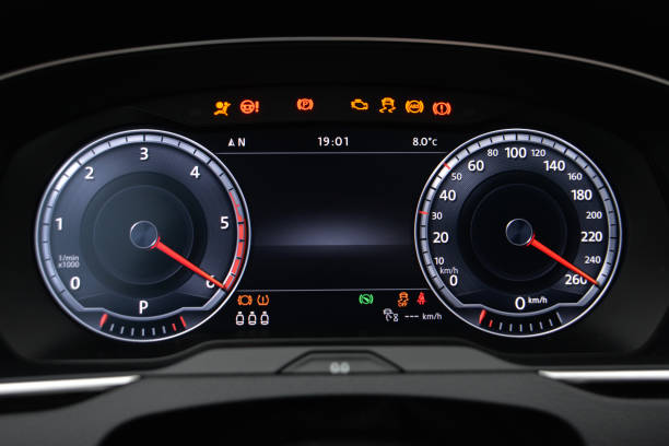 istock Car dashboard display showing speed RPM and warning lights 2204025784
