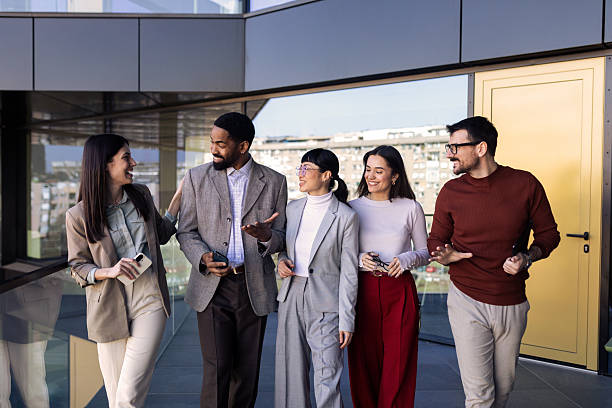 istock Business team walking in the office 2204034069