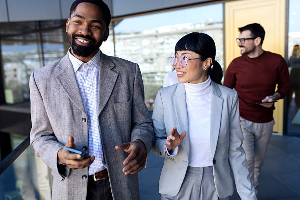 istock Business team walking in the office 2204034150