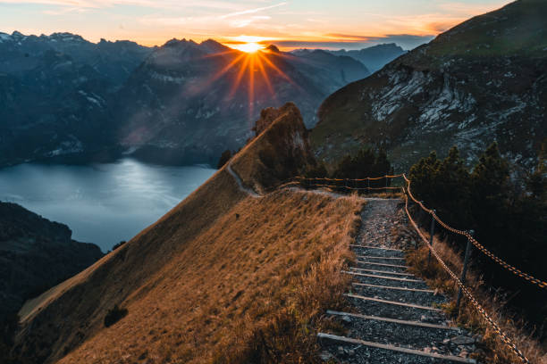 istock Elevated view of mountain pathway above lake in autumn 2204035689