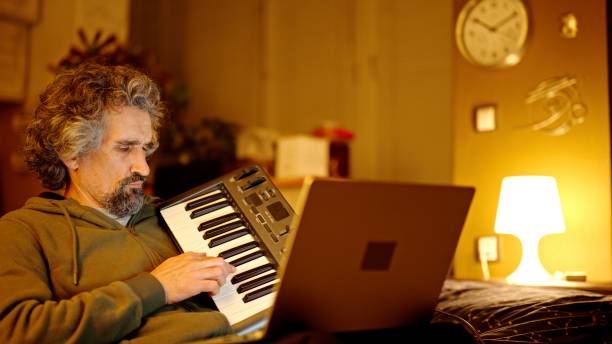 istock Adult Student Online Learning Music Late At Night 2204036856