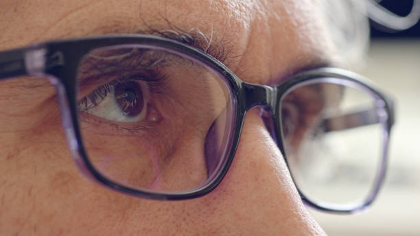 istock Male Eyes with Glasses Working on Computer. CU 2204036861
