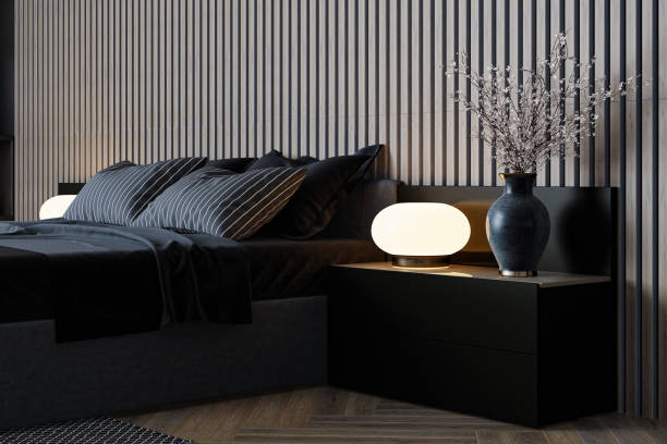 istock Luxurious Black Bedroom with Modern Lighting and Stylish Shelving 2204039465