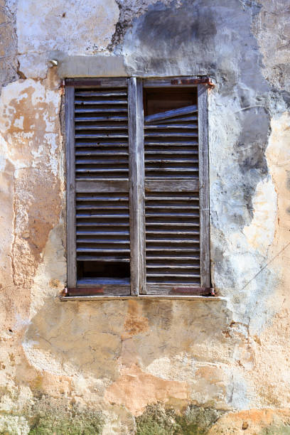 istock Mallorca, Spain. Wood shuttered window. 2204051283