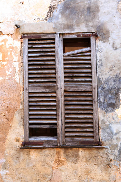 istock Mallorca, Spain. Wood shuttered window. 2204051298