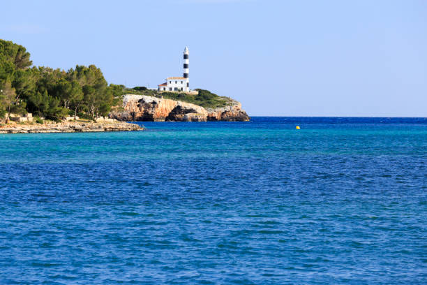 Europe, Spain, Balearic Islands, Mallorca. Porto Colom. Lighthouse.