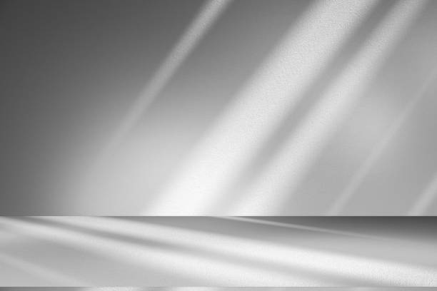 istock Wall interior background, studio and backdrops show products.with shadow from window color white . background for text insertion and presentation product 2204055017