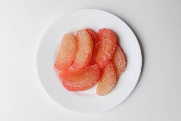 Two halves of grapefruit.