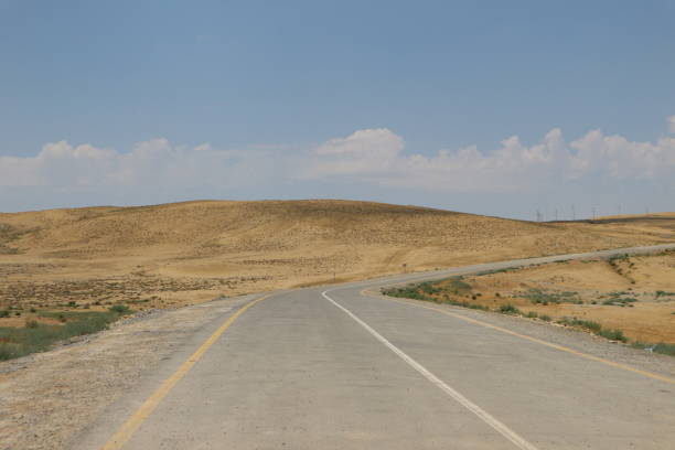 An endless road through the desert, breathtaking journey into the horizon.