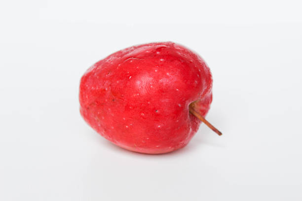 A strawberry apples or cherry apple, isolated on white background