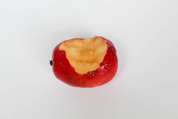 istock Bitten of strawberry apples or cherry apple, isolated on white background 2204063805
