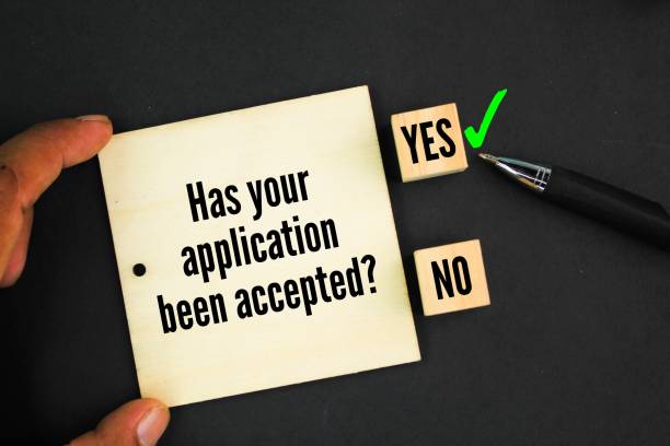 istock wooden square with the question word Has your application been accepted? yes 2204064181