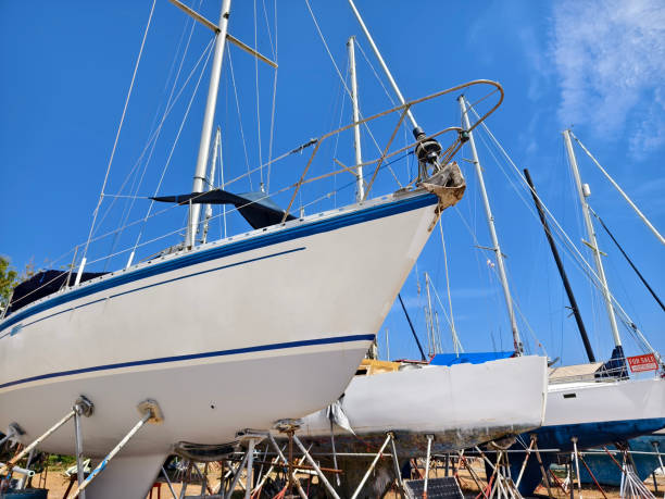 istock A white voyage boat featuring a steering wheel floating in the dock 2204070561
