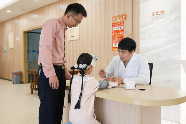istock The doctor checks the client's pulse 2204071426