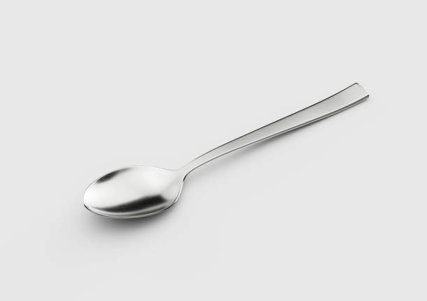 A Gleaming Metal Spoon With Its Elongated Handle And Rounded Bowl White Background 3D Illustration