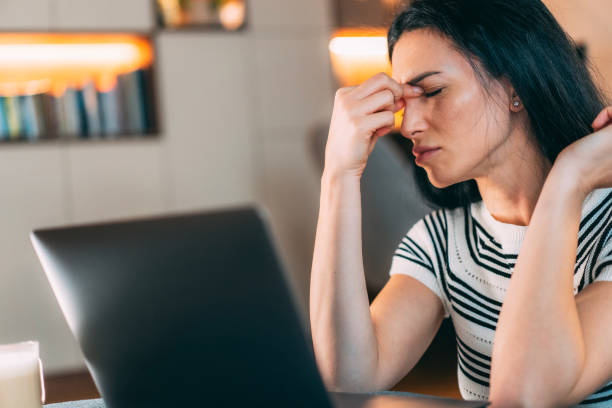 istock Tired Woman Working from Home 2204072745