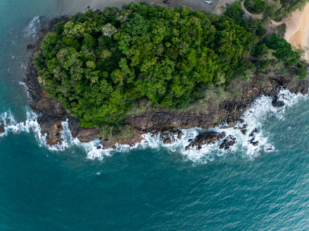 istock Bird eye view seashore with waves crashing on rock cliff,Beautiful waves sea surface in sunset time, Amazing seascape top view seacoast landscape view 2204072903