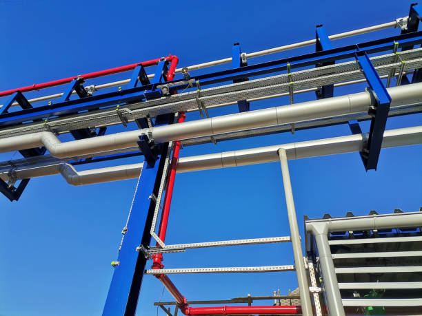 istock Steel structure is under construction on the construction site against a blue sky backdrop 2204085810