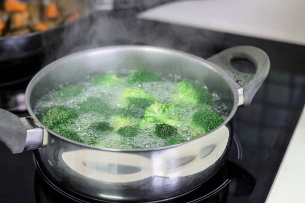 istock Healthy food. Nutrition. Cooking broccoli. 2204092864