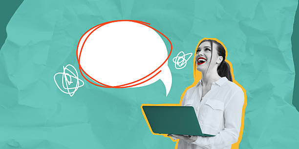 istock Woman holding laptop with empty speech bubble for mockup. 2204096578