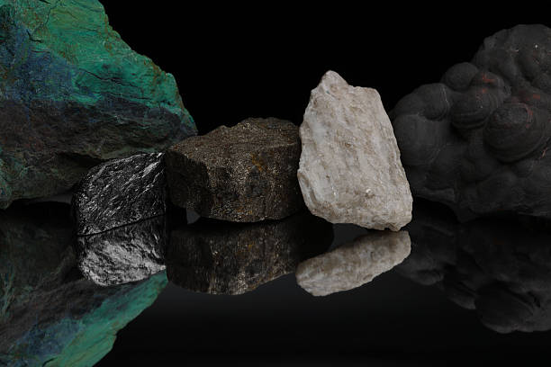 Critical battery mineral ores, copper, graphite, nickel, lithium, manganese. Reflection in mirror. Symmetry. Mine, mining. Industry, finance and business