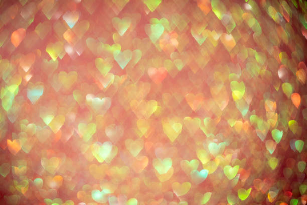 Colorful heart bokeh lights creating a delightful and romantic abstract background