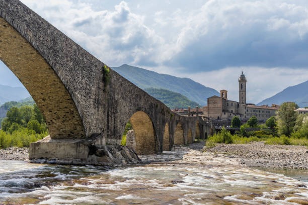 istock Gobbo Bridge also Devil Bridge or Ponte del Diavolo or Ponte Gobbo in Bobbio, Piacenza province, Trebbia Valley, Emilia Romagna, Italy 2204106073