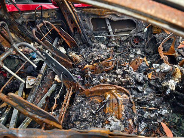 istock Charred remnants of a vehicle interior left behind after a devastating fire incident 2204108216