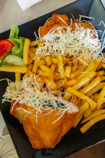 istock cordon bleu with french fries 2204111923