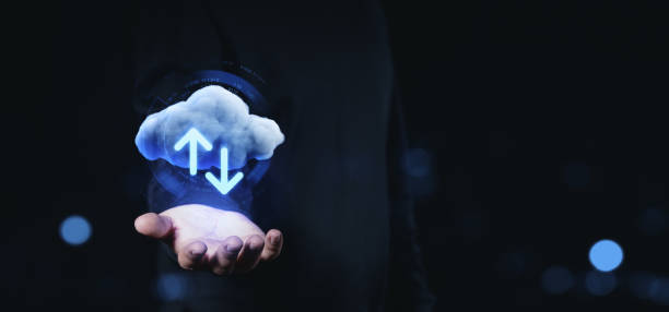 istock Cloud storage and data transfer concept with glowing upload and download arrows in a hand. 2204113352