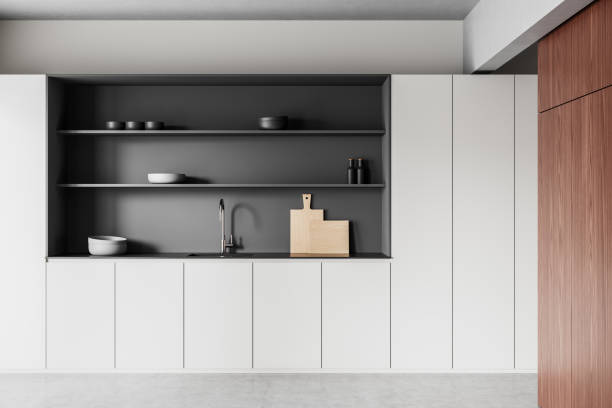 istock Modern minimalist kitchen interior with white cabinets and gray open shelving. 3D Rendering 2204113875