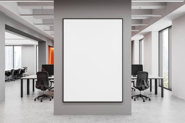 istock Blank poster mockup in modern office interior with open workspace. 3D Rendering 2204114067