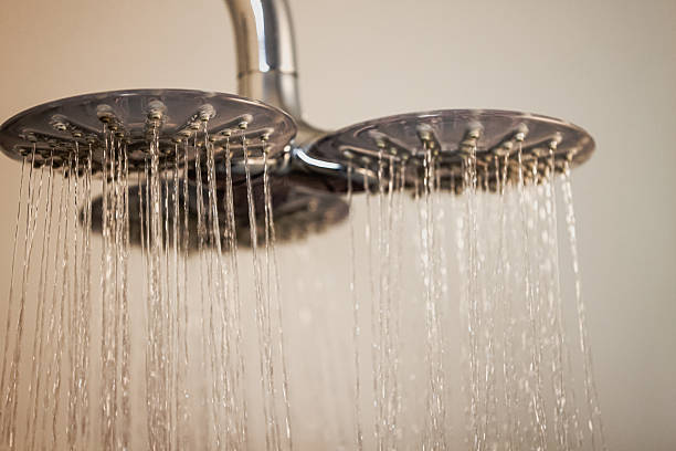 istock Close-Up of Flowing Water from Rain Shower Head 2204120068
