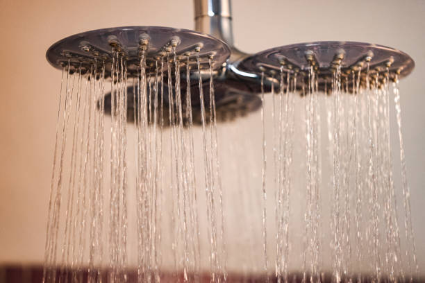 istock Cascading Elegance – Dual Shower Bliss in a Modern Spa 2204120255