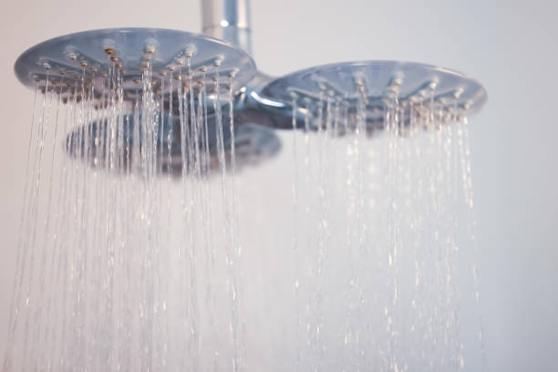 istock Luxury Dual Shower Head with Flowing Water – Modern Bathroom Design 2204120256
