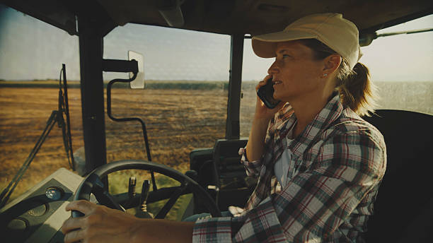 istock Tech-Savvy Farming,Woman Balances Fieldwork and Communication 2204121866