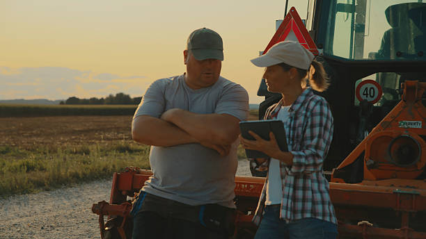 istock Farmers Discussing Strategy 2204122474