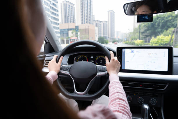istock Young Asian woman driving a car 2204124566