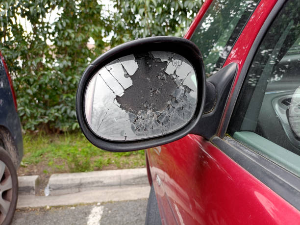 Unexpected problems of a motorist car with broken side mirror . concept: factors leading to accidents broken side view mirror stock pictures, royalty-free photos & images